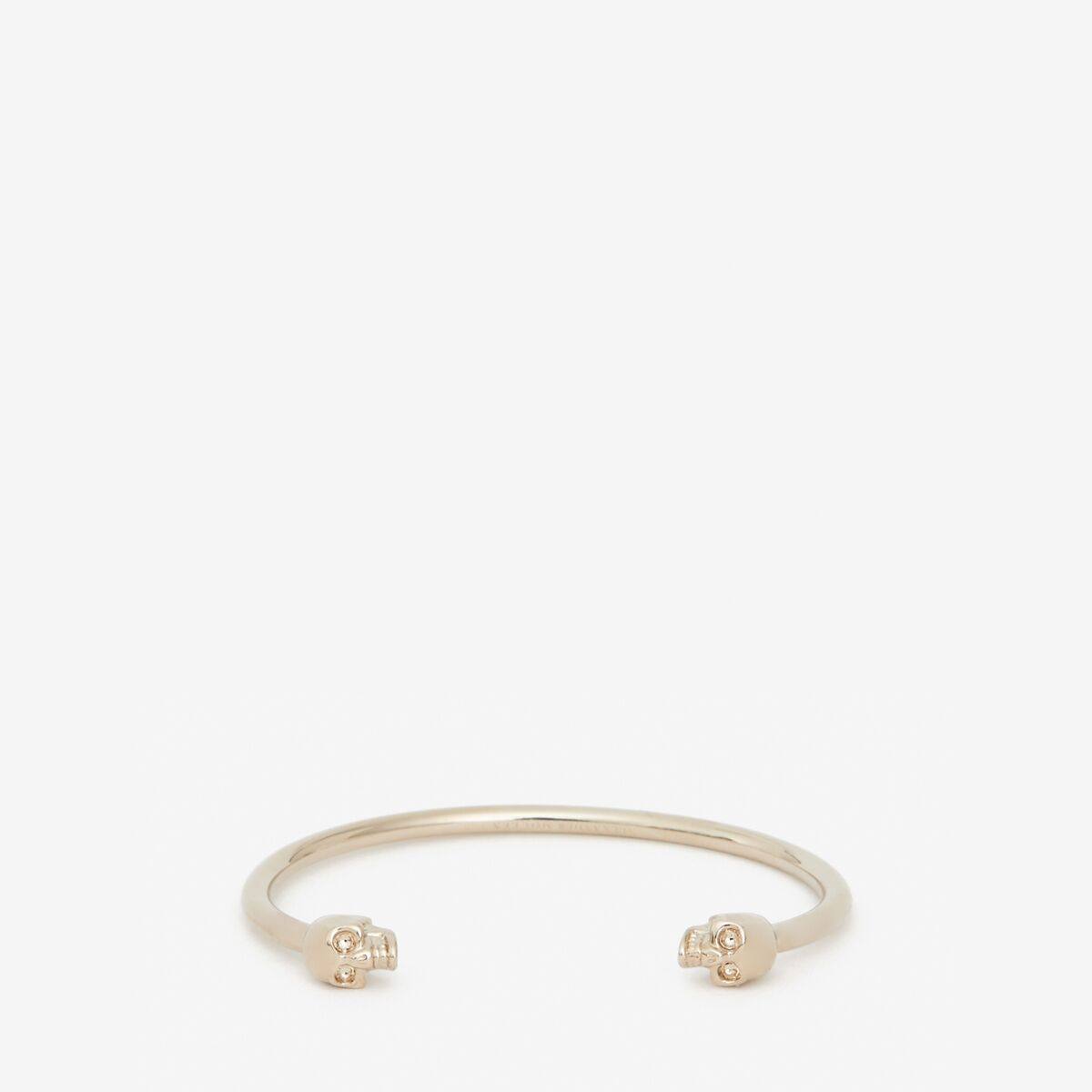 Alexander McQueen Women's Gold Twin skull bracelet - M (Brass)
